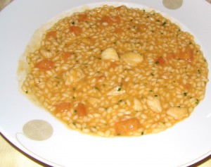 Vialone Nano mantecato all'extravergine con zuppa di pesce povero